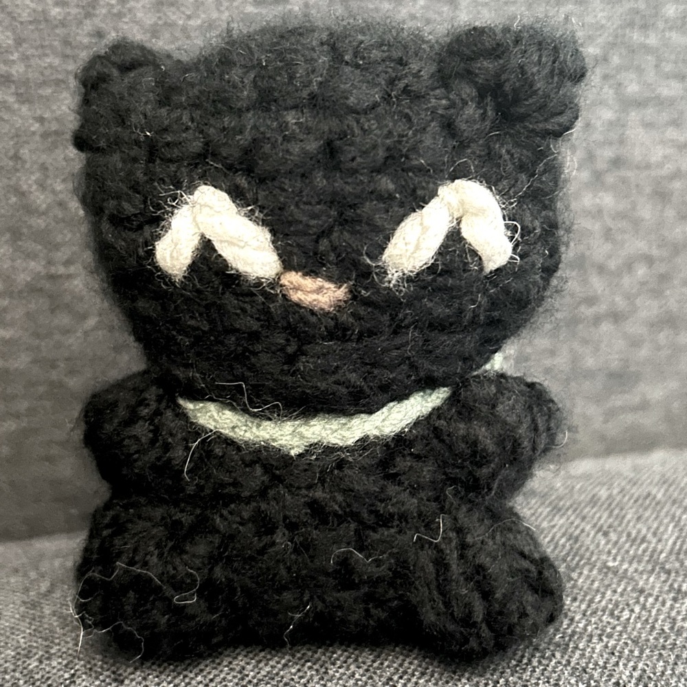 Mini Chococat sporting a green bow!